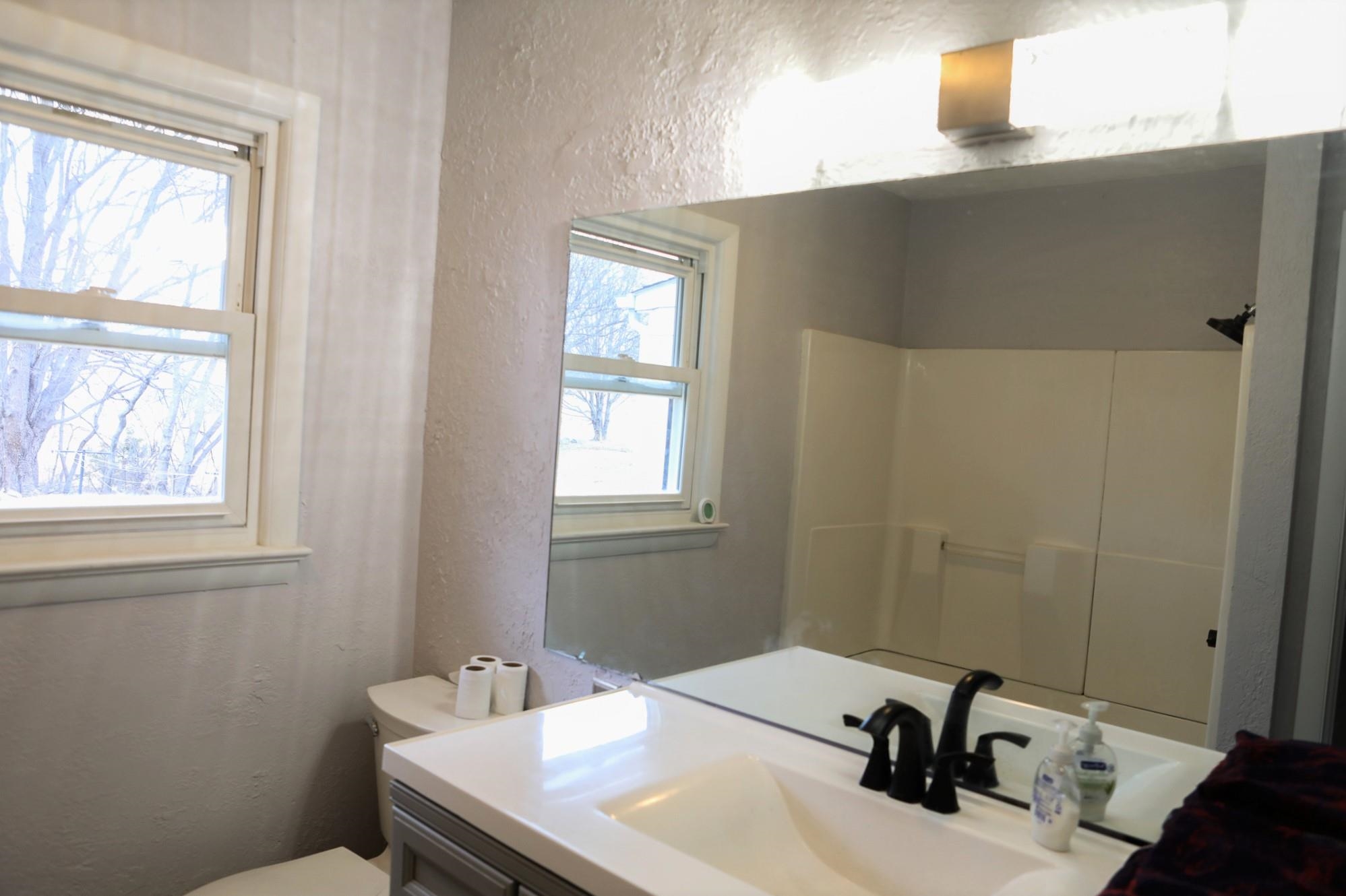 1613 Howardsville Road Staunton, VA 24401 - Photo 25 of 41 a bathroom with a sink and a window