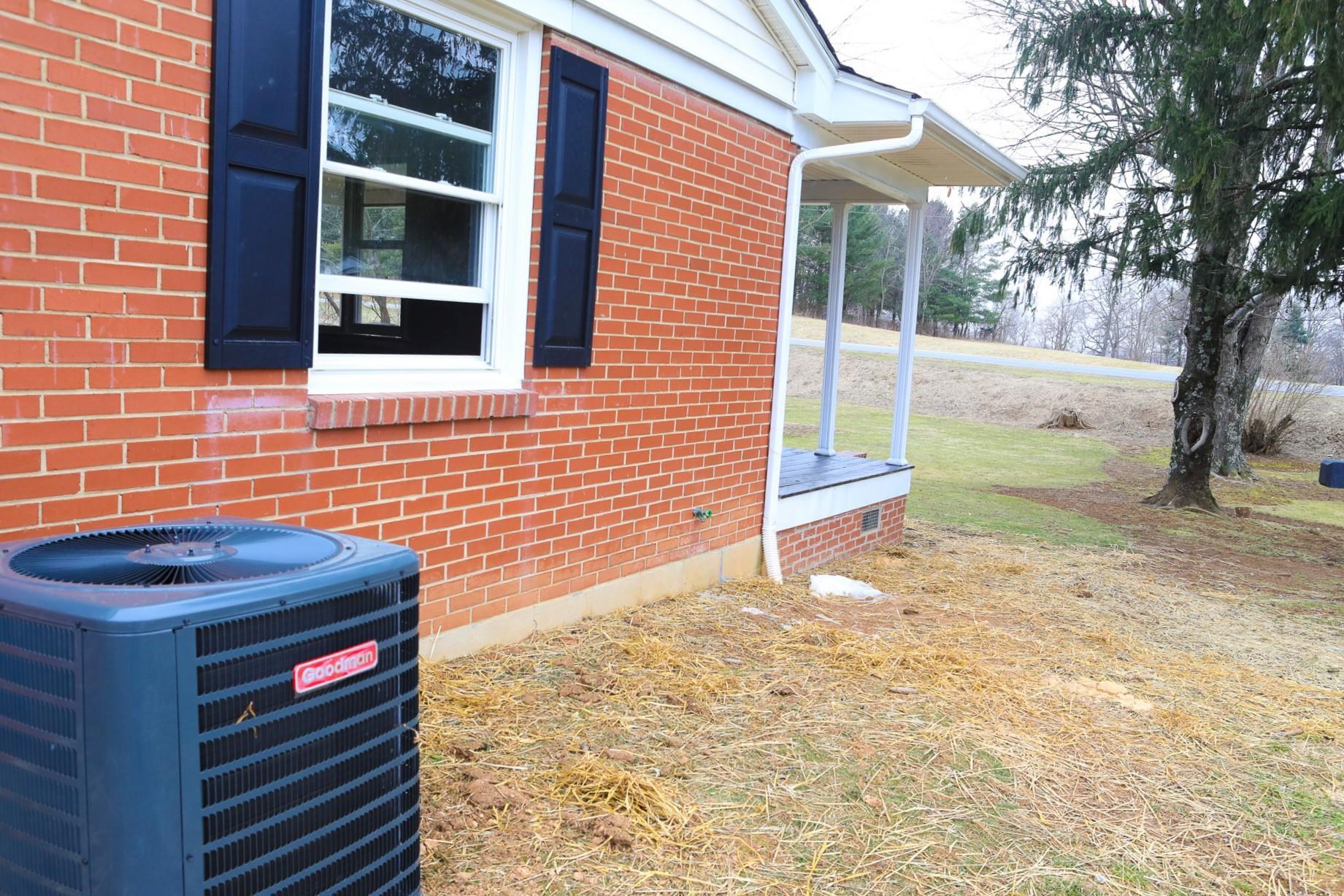 1613 Howardsville Road Staunton, VA 24401 - Photo 35 of 41 a backyard of a house with barbeque oven