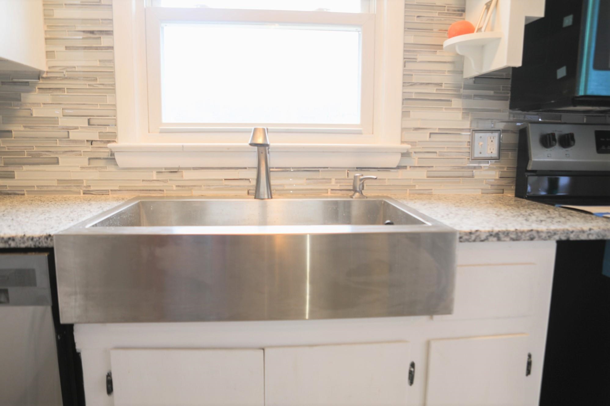 1613 Howardsville Road Staunton, VA 24401 - Photo 10 of 41 a view bathroom with granite countertop a sink and a window