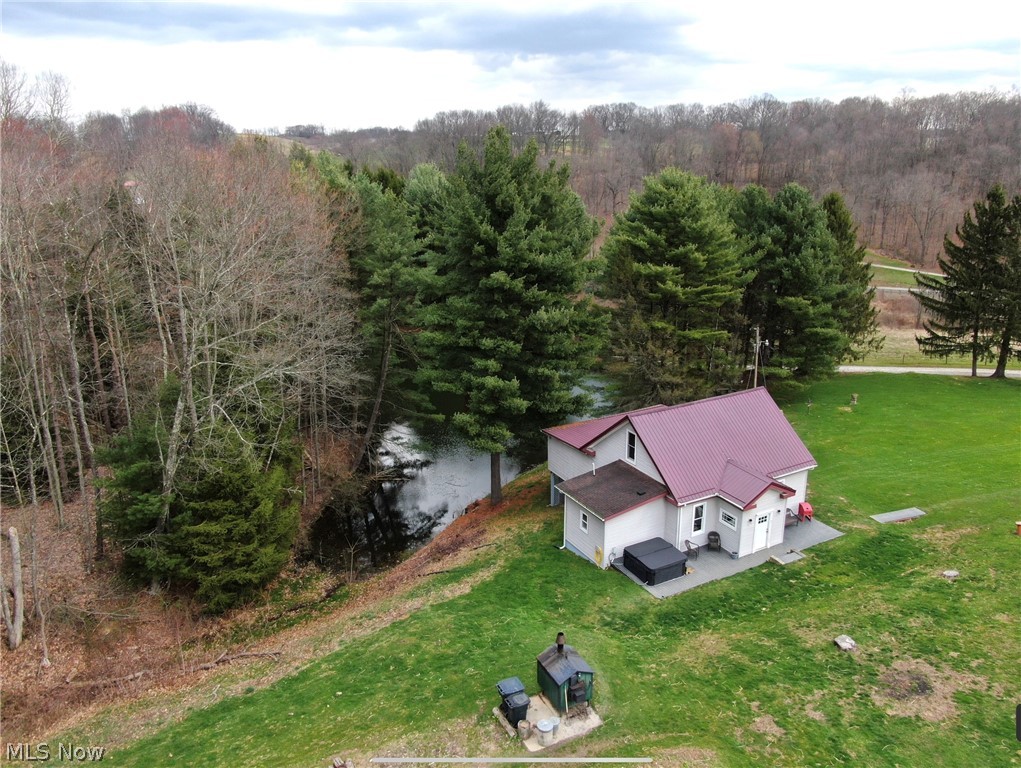 8009 Scio Road Scio, OH 43988 - Photo 3 of 33 Aerial view featuring pond, home, and wood burner