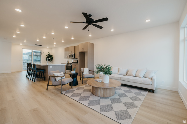 2759 Becco Trail, Unit 16 St. George, UT 84770 - Photo 11 of 42 Living area with light wood-style flooring, ceiling fan, and recessed lighting