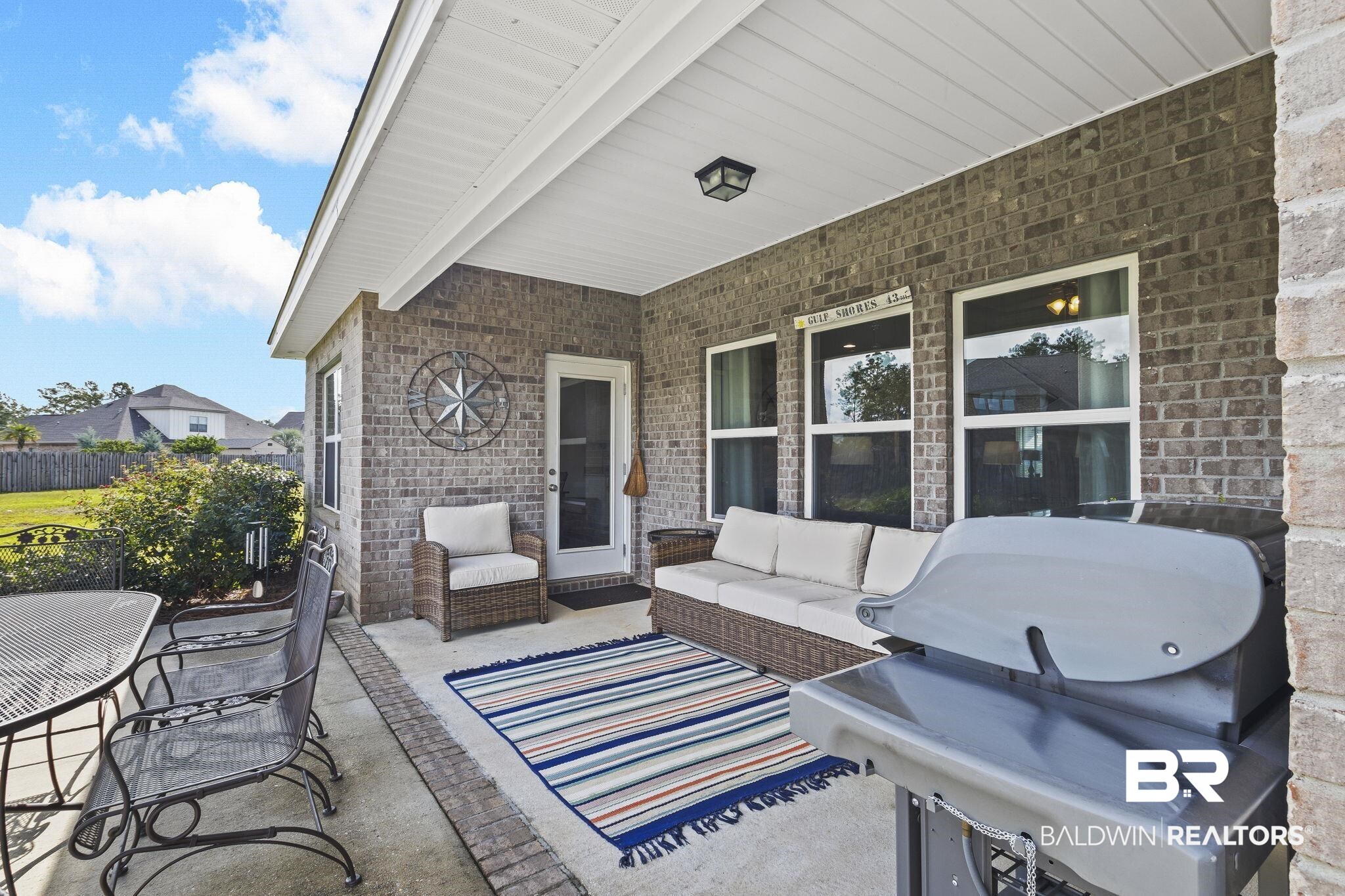 31663 Kestrel Loop Daphne, AL 36527 - Photo 61 of 86 View of patio / terrace with a grill and an outdoor living space
