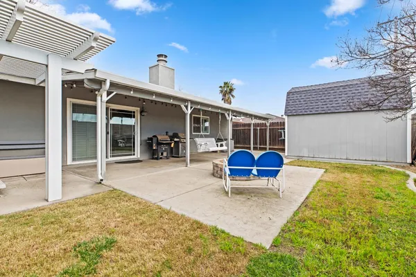 a house view with a backyard space