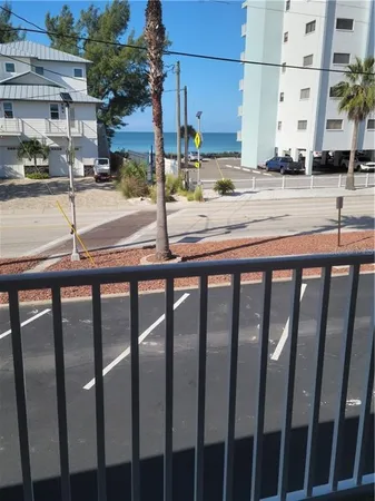 a view of a street with cars