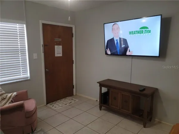 a room with a bed and couch