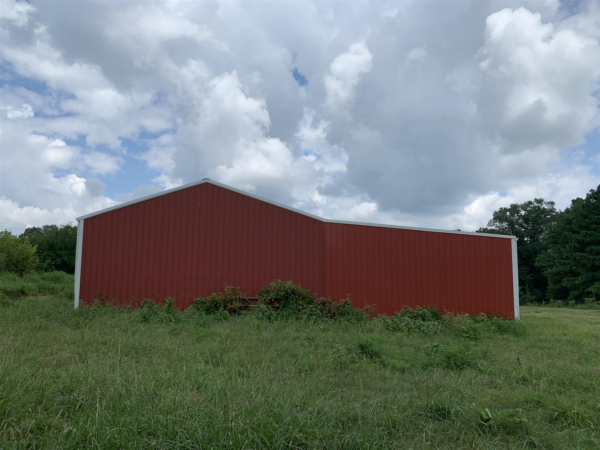 0 Newt Hood Road Columbia, TN 38401 - Photo 22 of 27 a backyard of a house with lots of green space and wooden fence