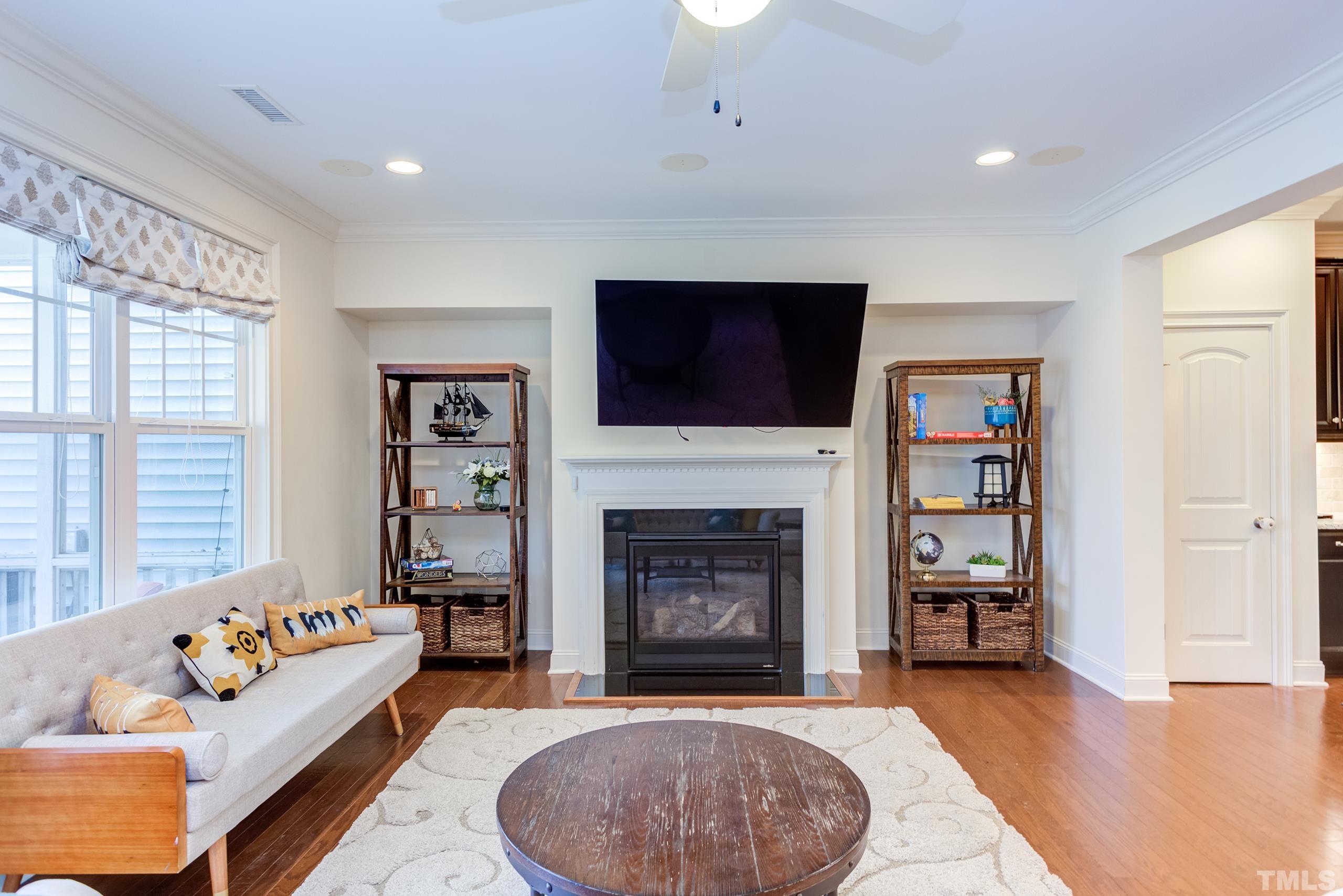 449 Talons Rest Way Cary, NC 27513 - Photo 19 of 54 a living room with furniture and a fireplace