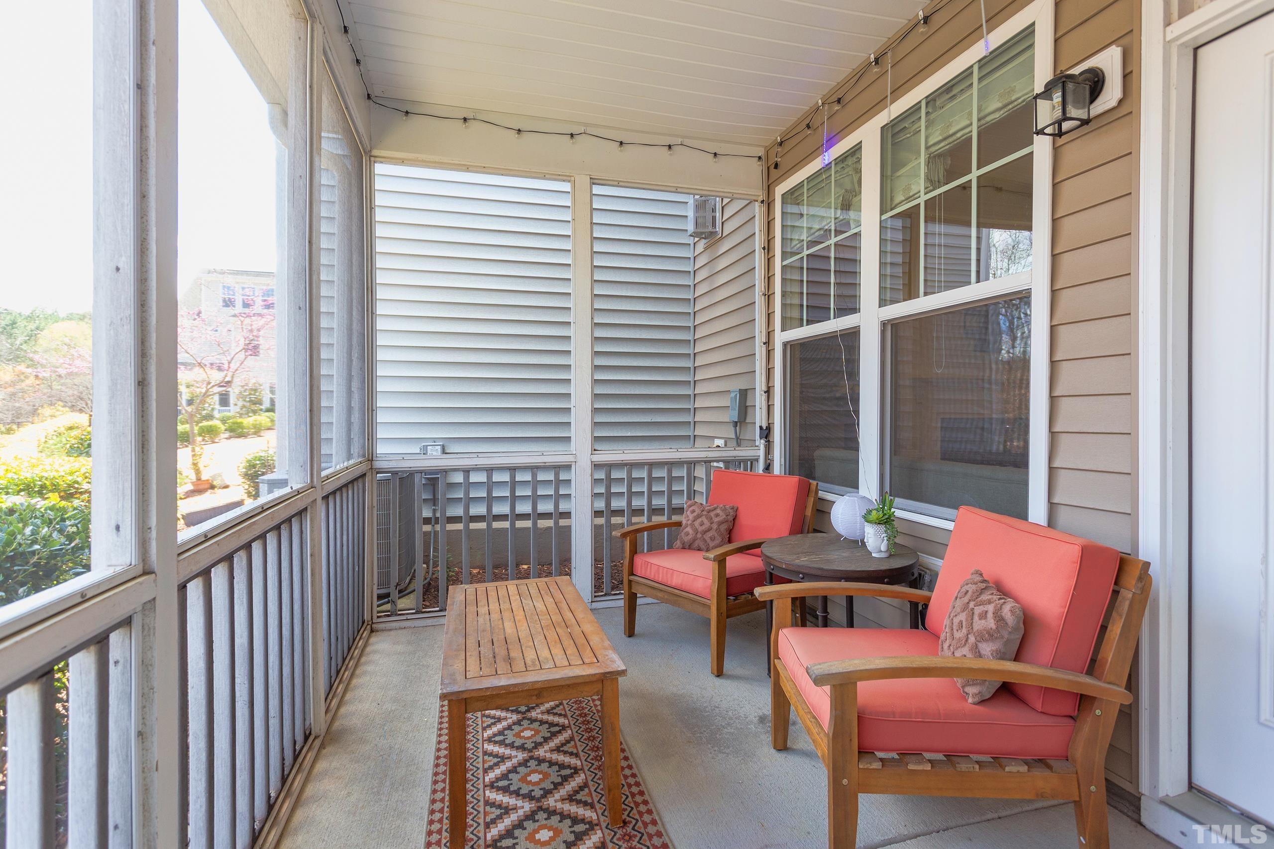 449 Talons Rest Way Cary, NC 27513 - Photo 45 of 54 a balcony with furniture and wooden floor