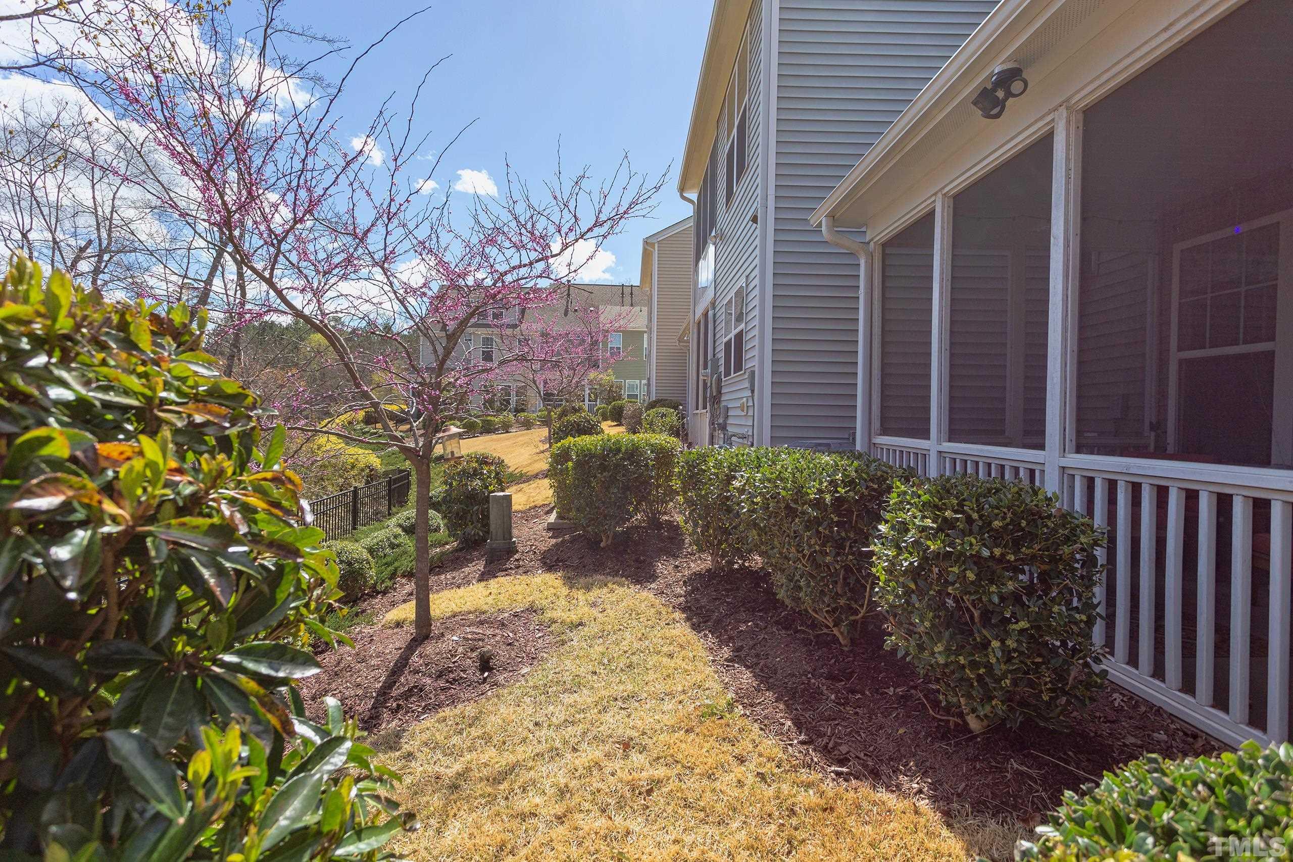 449 Talons Rest Way Cary, NC 27513 - Photo 48 of 54 a view of a pathway with a flower garden