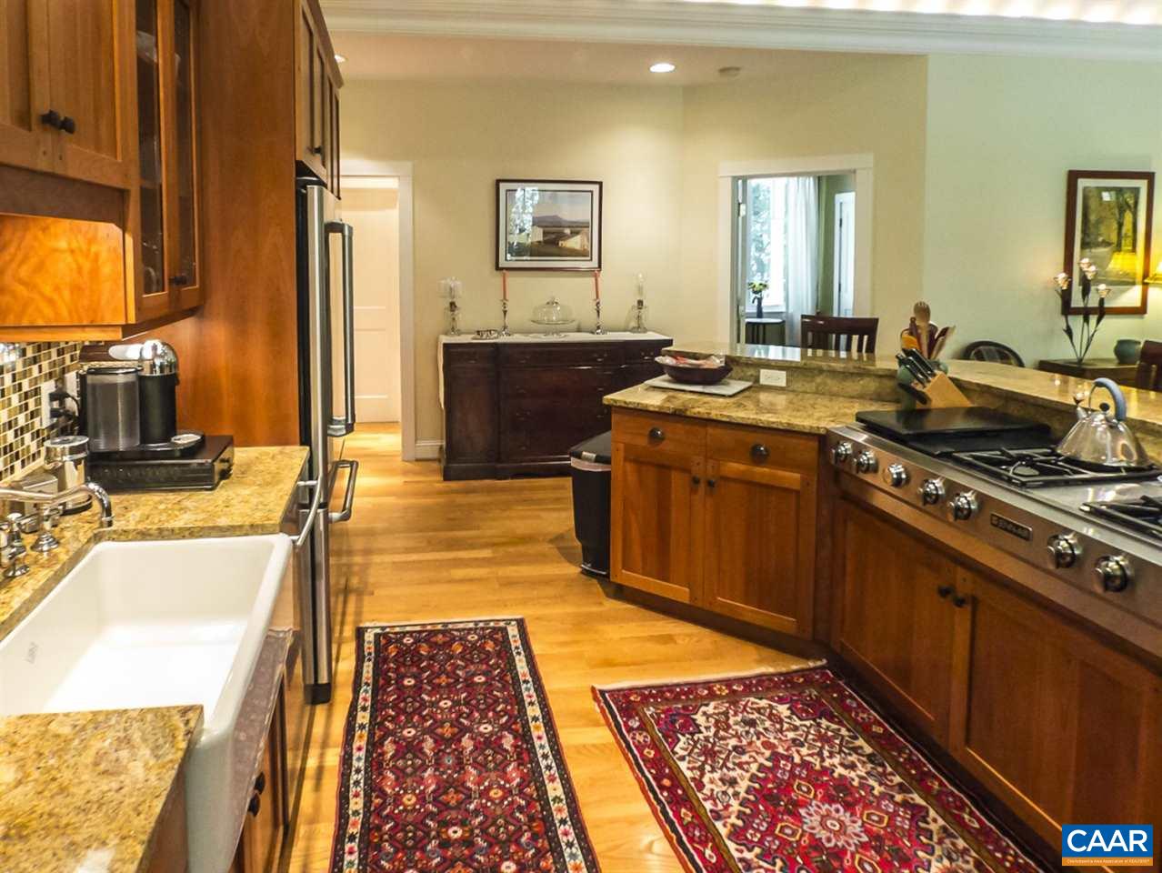2707 Heartwood Road Afton, VA 22920 - Photo 6 of 31 a kitchen with stainless steel appliances granite countertop a stove a sink and a microwave