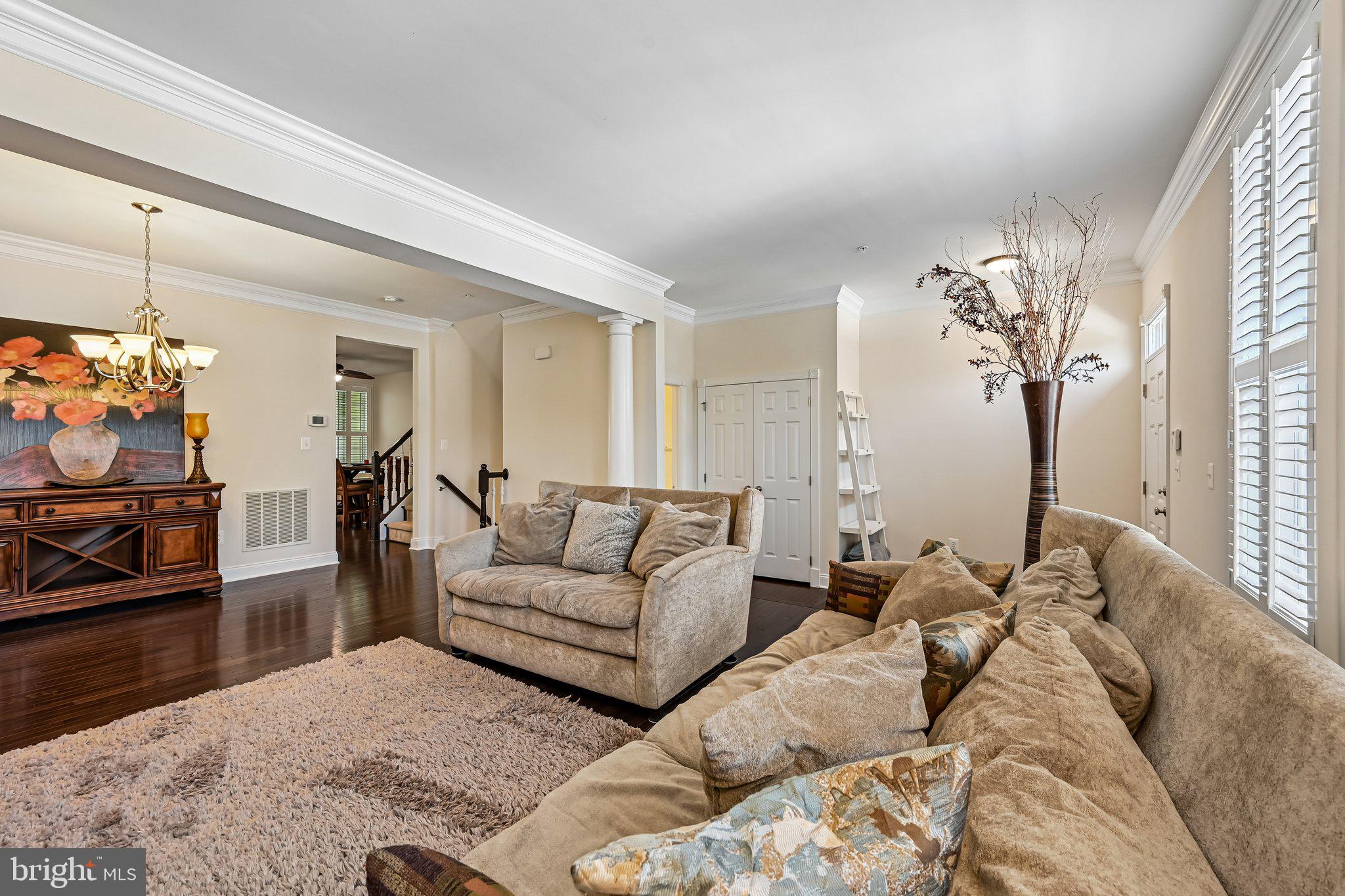 2271 Brimstone Place Hanover, MD 21076 - Photo 12 of 62 Inviting open space with warm tones.