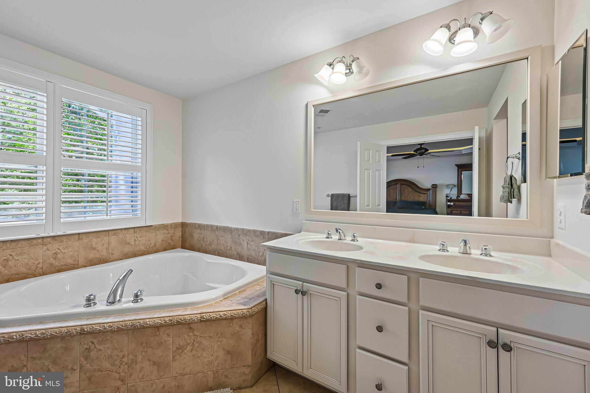 2271 Brimstone Place Hanover, MD 21076 - Photo 44 of 62 Serene bathroom retreat with natural light.