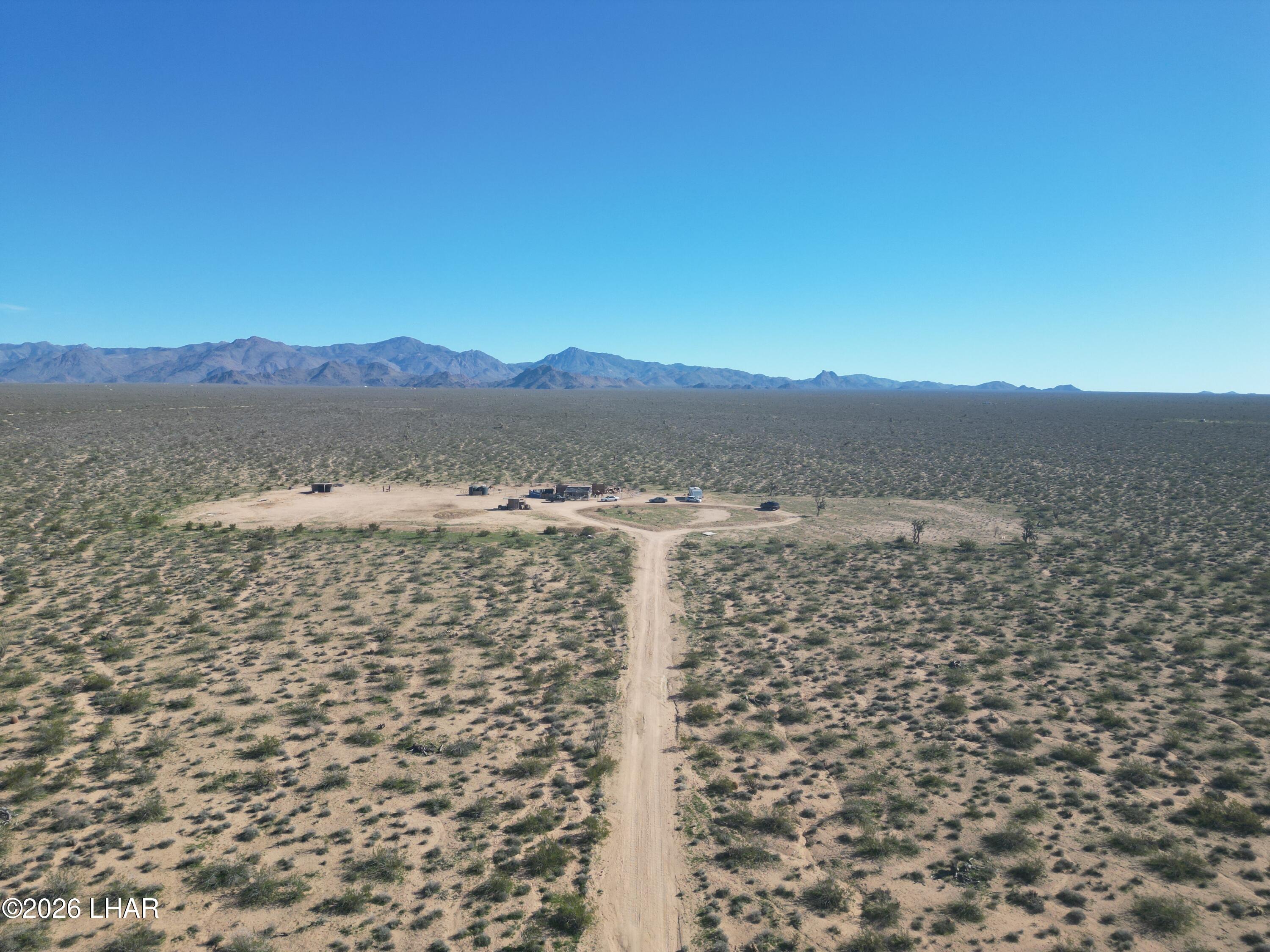 18206 South Gene Autry Road Yucca, AZ 86438 - Photo 6 of 17 a view of a lake with mountain
