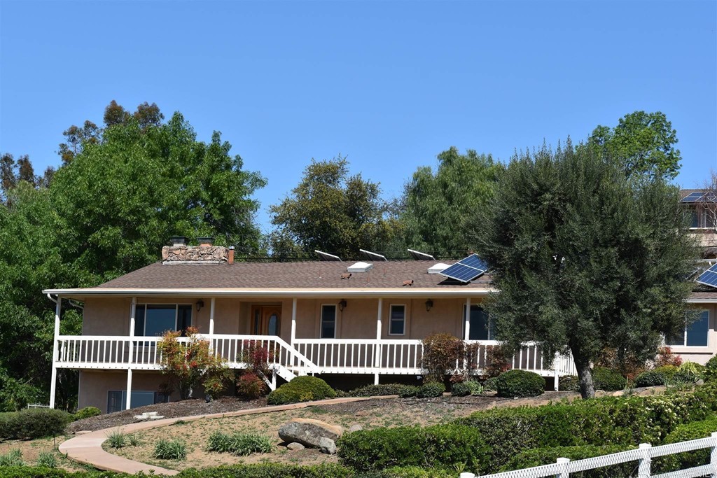 3165 Peg Leg Mine Road Jamul, CA 91935 - Photo 1 of 1 a front view of a house with garden