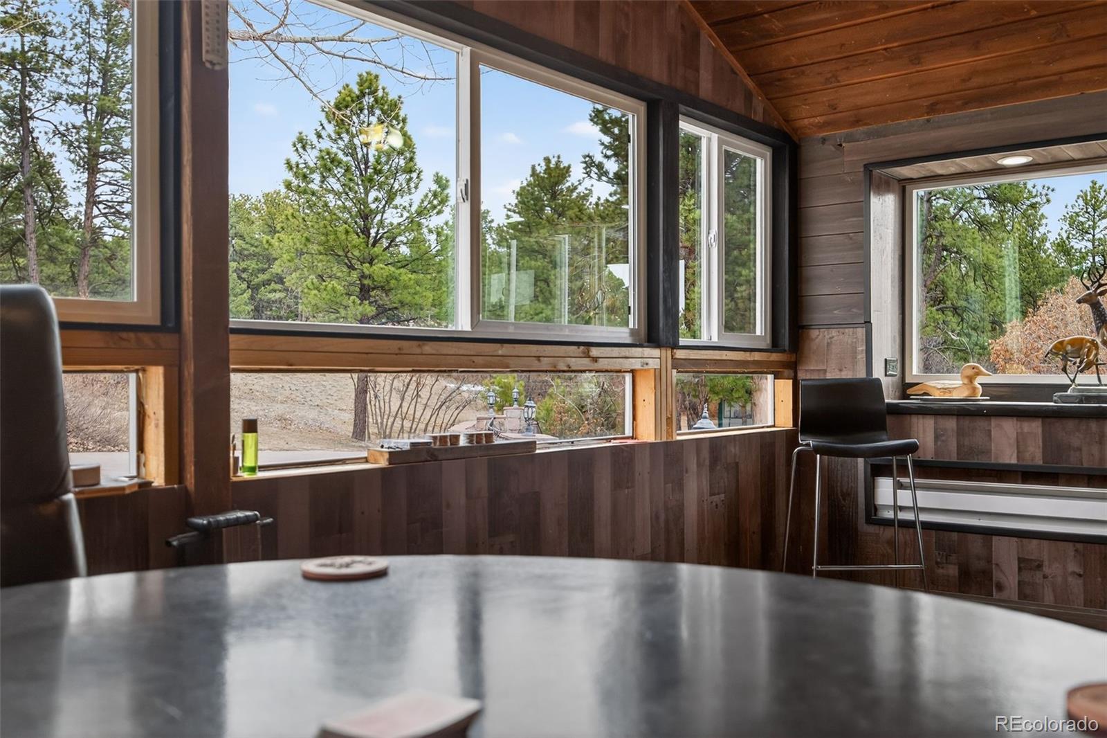 450 East Happy Canyon Road Castle Rock, CO 80108 - Photo 40 of 48 wooden floor in an empty room with wooden floor