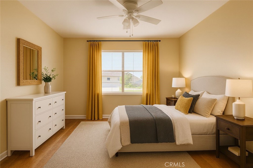 4530 West Ridgecrest Boulevard Ridgecrest, CA 93555 - Photo 9 of 18 a bedroom with a bed and a dresser