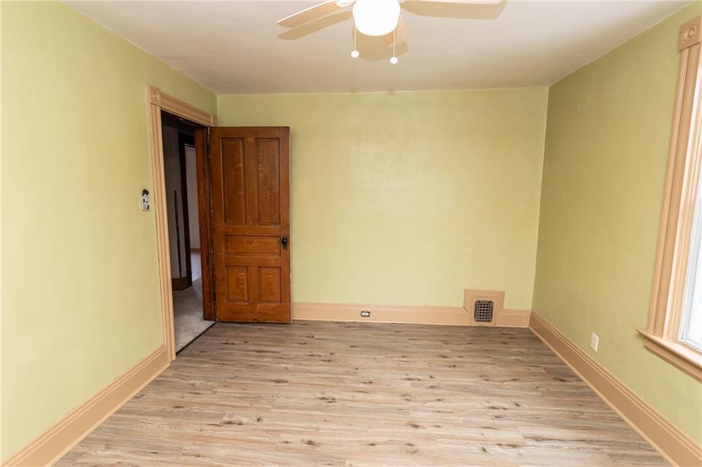 1206 Sycamore Street Connellsville, PA 15425 - Photo 22 of 35 a view of room with window and wooden floor