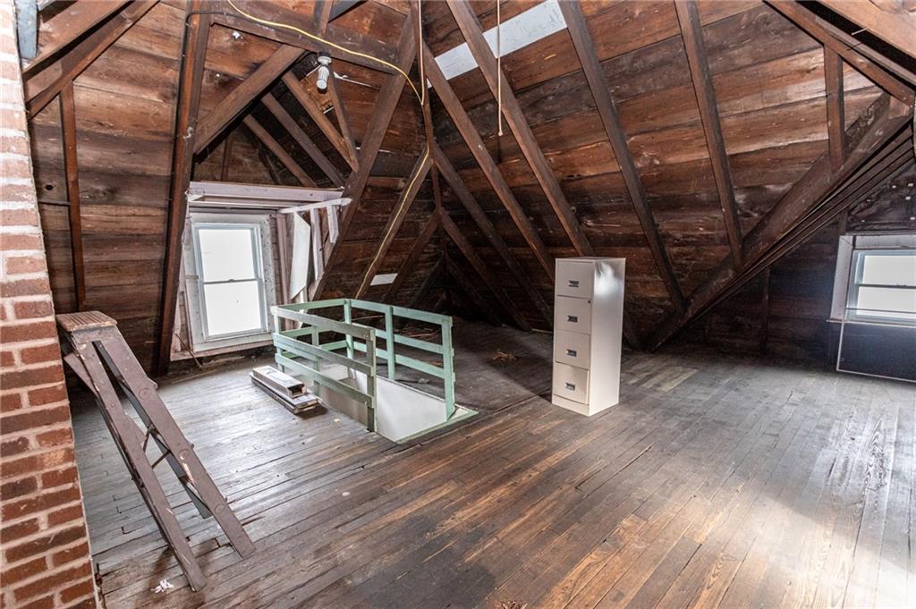 1206 Sycamore Street Connellsville, PA 15425 - Photo 32 of 35 a view of an empty room with wooden floor