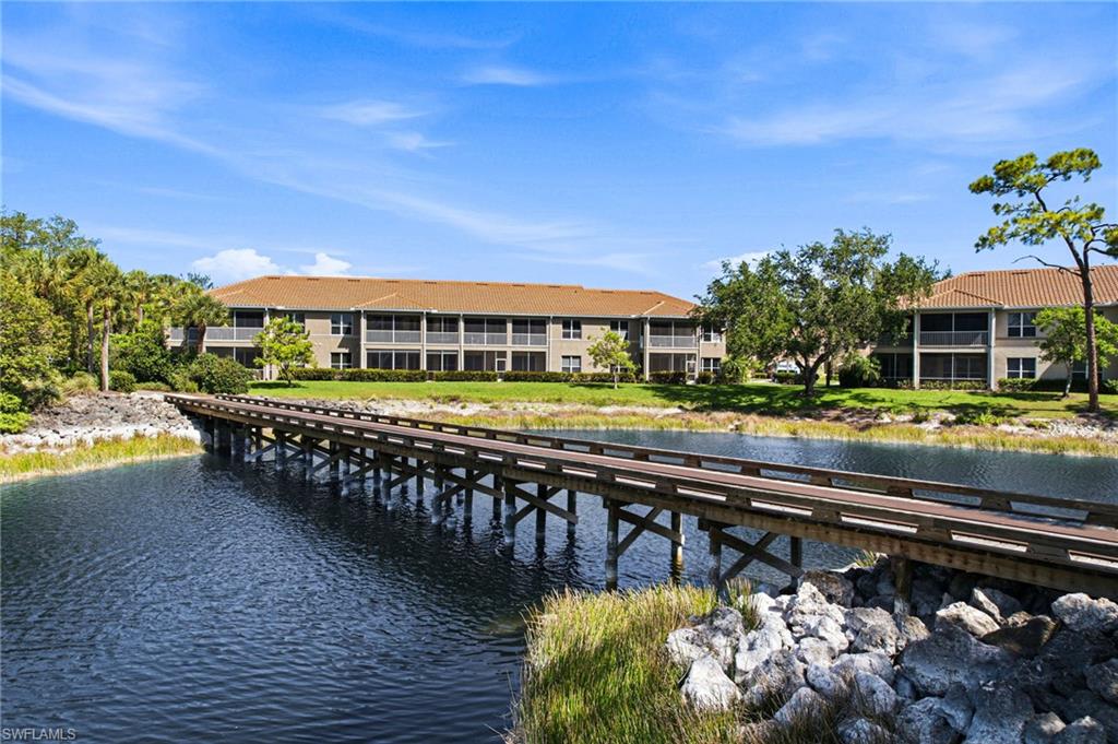 8430 Radcliffe Terrace, Unit 202 Naples, FL 34120 - Photo 3 of 37 STUNNING BRIDGE AND SCENIC WOODED VISTA!