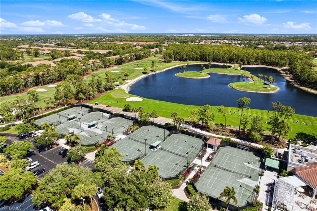 8430 Radcliffe Terrace, Unit 202 Naples, FL 34120 - Photo 32 of 37 an aerial view of residential houses with outdoor space