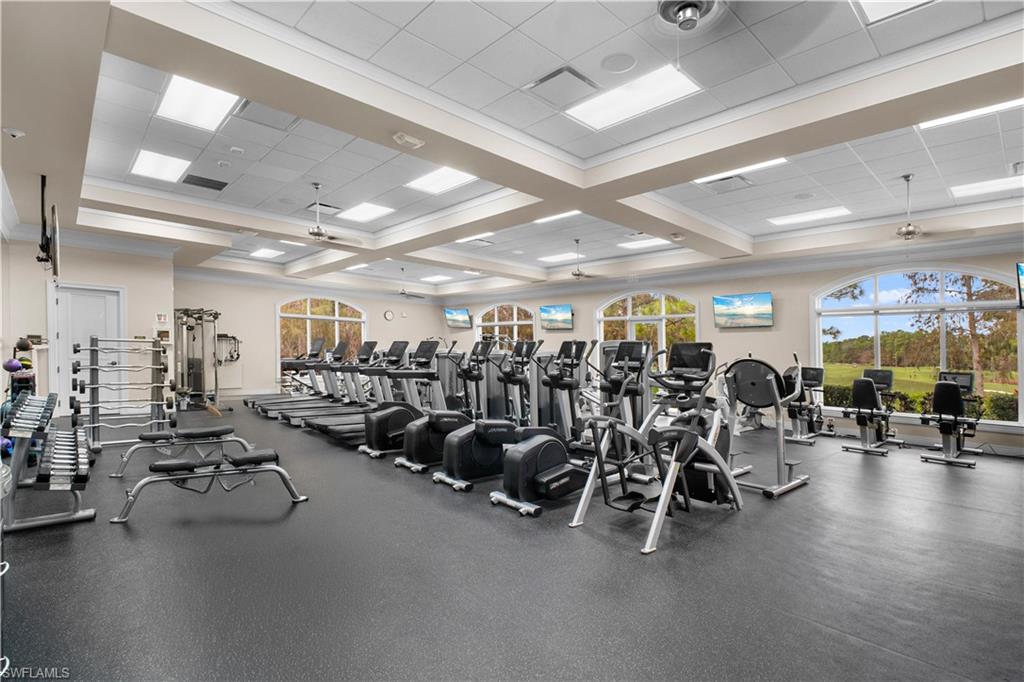 8430 Radcliffe Terrace, Unit 202 Naples, FL 34120 - Photo 33 of 37 a view of a room with gym equipment