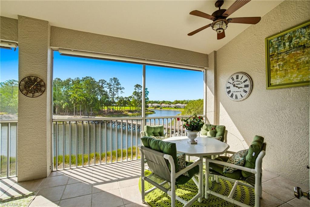 8430 Radcliffe Terrace, Unit 202 Naples, FL 34120 - Photo 4 of 37 a view of a chairs and table in patio