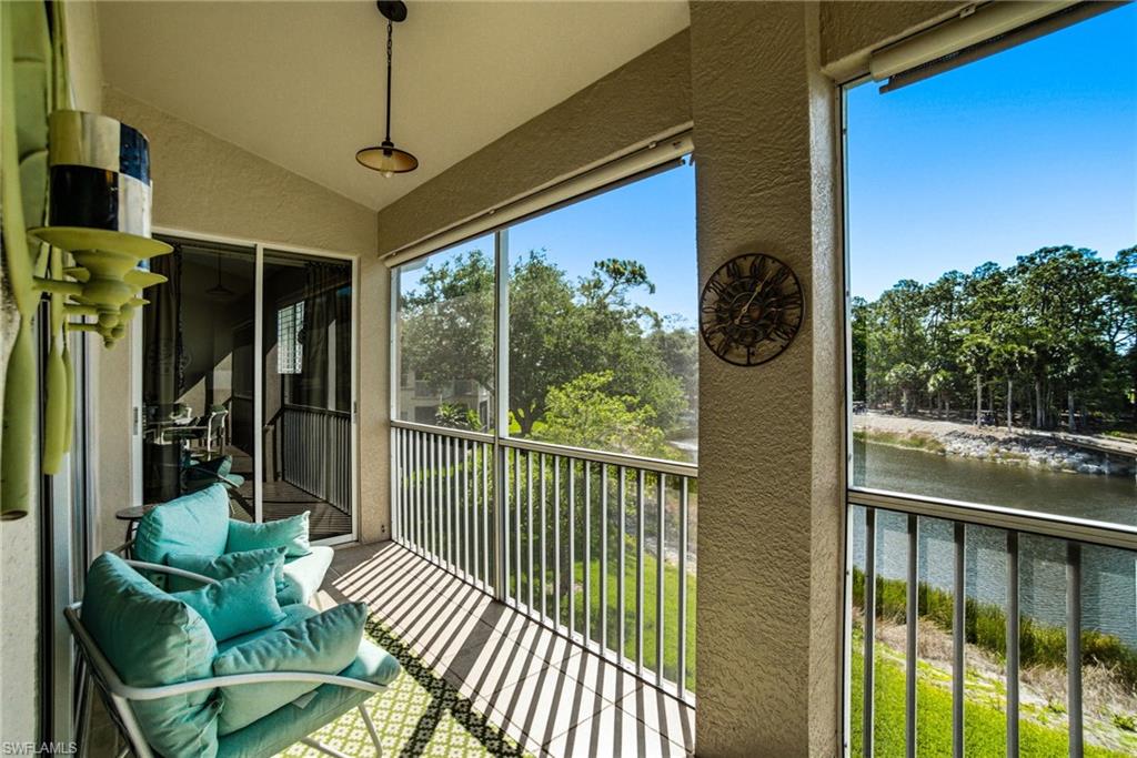 8430 Radcliffe Terrace, Unit 202 Naples, FL 34120 - Photo 5 of 37 a view of a balcony with couch