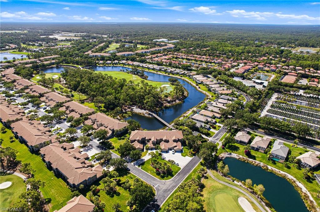 8430 Radcliffe Terrace, Unit 202 Naples, FL 34120 - Photo 6 of 37 an aerial view of residential houses with outdoor space