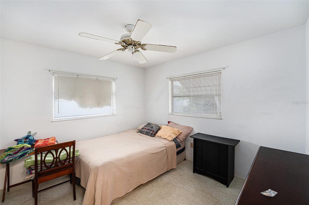 2066 High Ridge Drive Clearwater, FL 33763 - Photo 11 of 15 a bedroom with a bed and a window