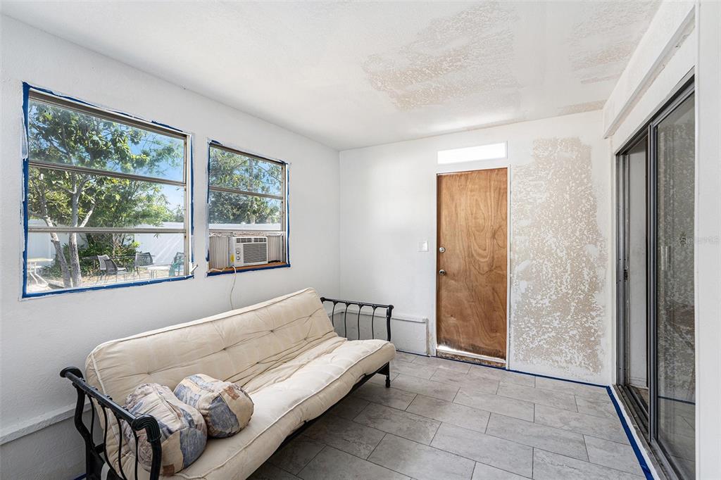 2066 High Ridge Drive Clearwater, FL 33763 - Photo 10 of 15 a bedroom with a bed and a window