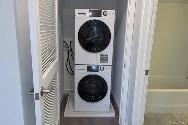 a utility room with dryer and washer