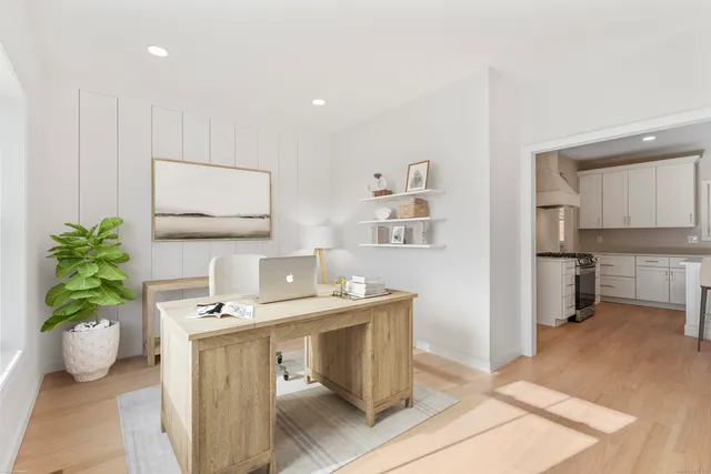a bathroom with a sink a vanity and a mirror