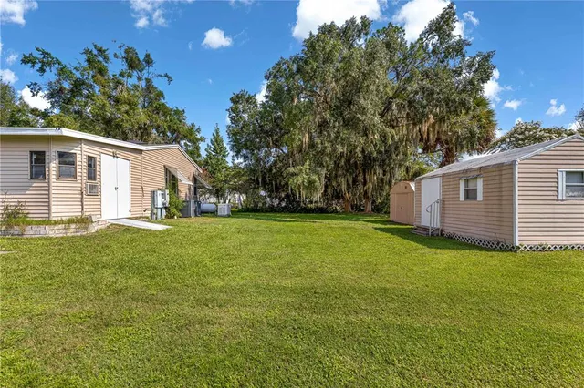 a view of a backyard with a garden