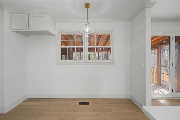 an empty room with windows