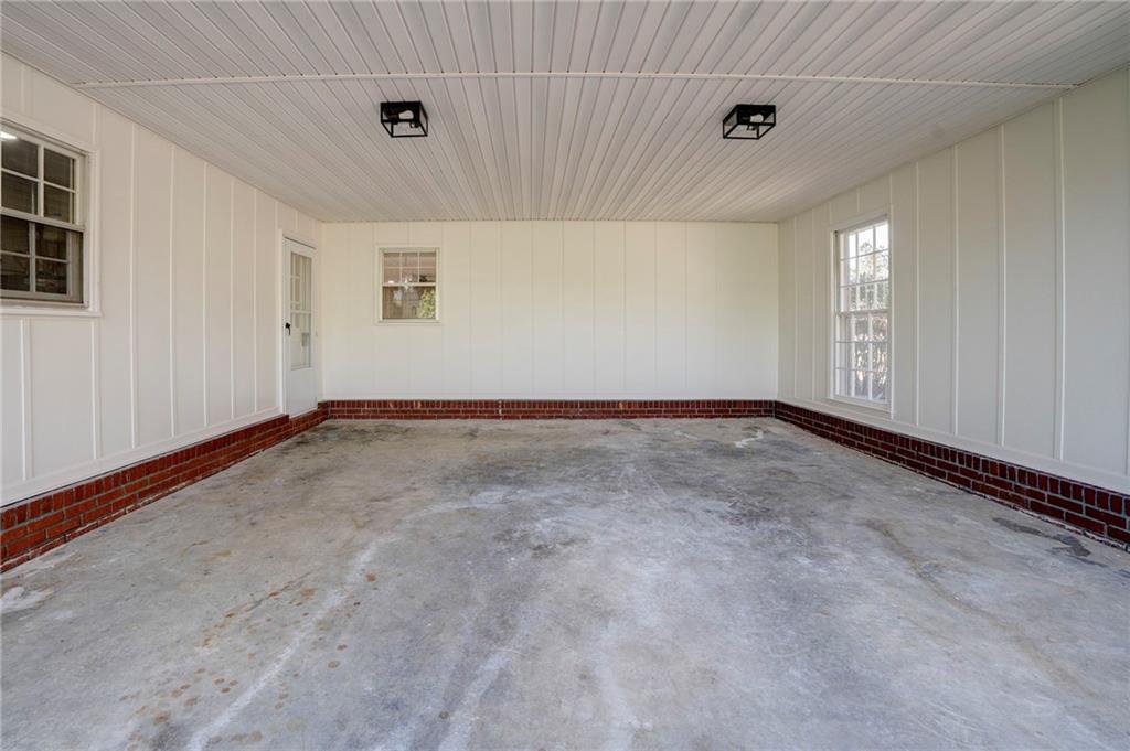 115 Devonwood Drive Calhoun, GA 30701 - Photo 26 of 35 an empty room with windows