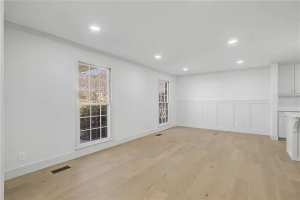 an empty room with windows