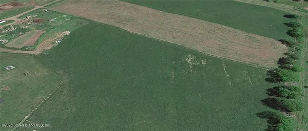 a view of a water from a yard