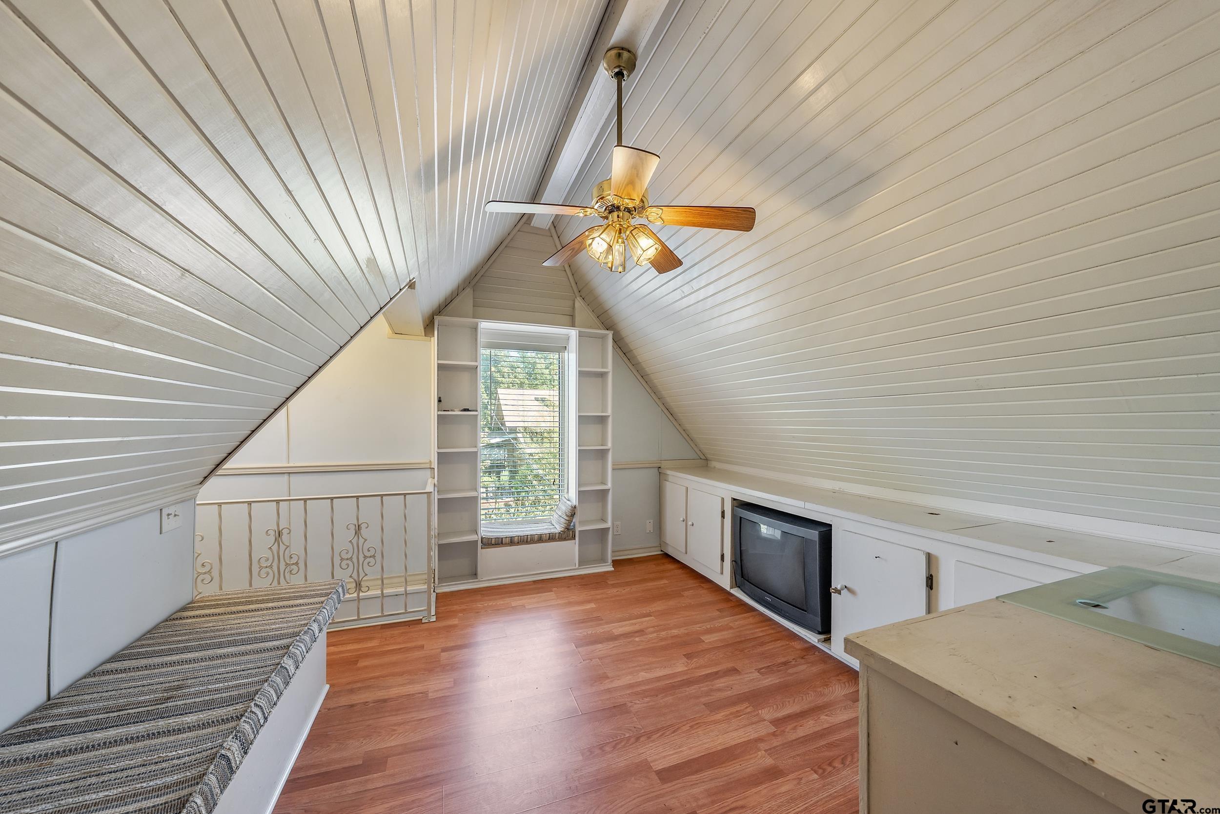 145 Rowland Place Tyler, TX 75701 - Photo 36 of 43 a view of an empty room with wooden floor and a window