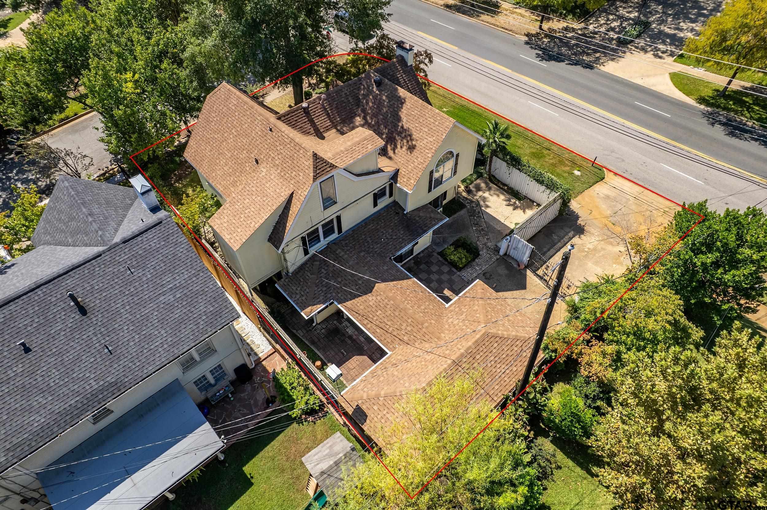 145 Rowland Place Tyler, TX 75701 - Photo 4 of 43 an aerial view of a house with a garden