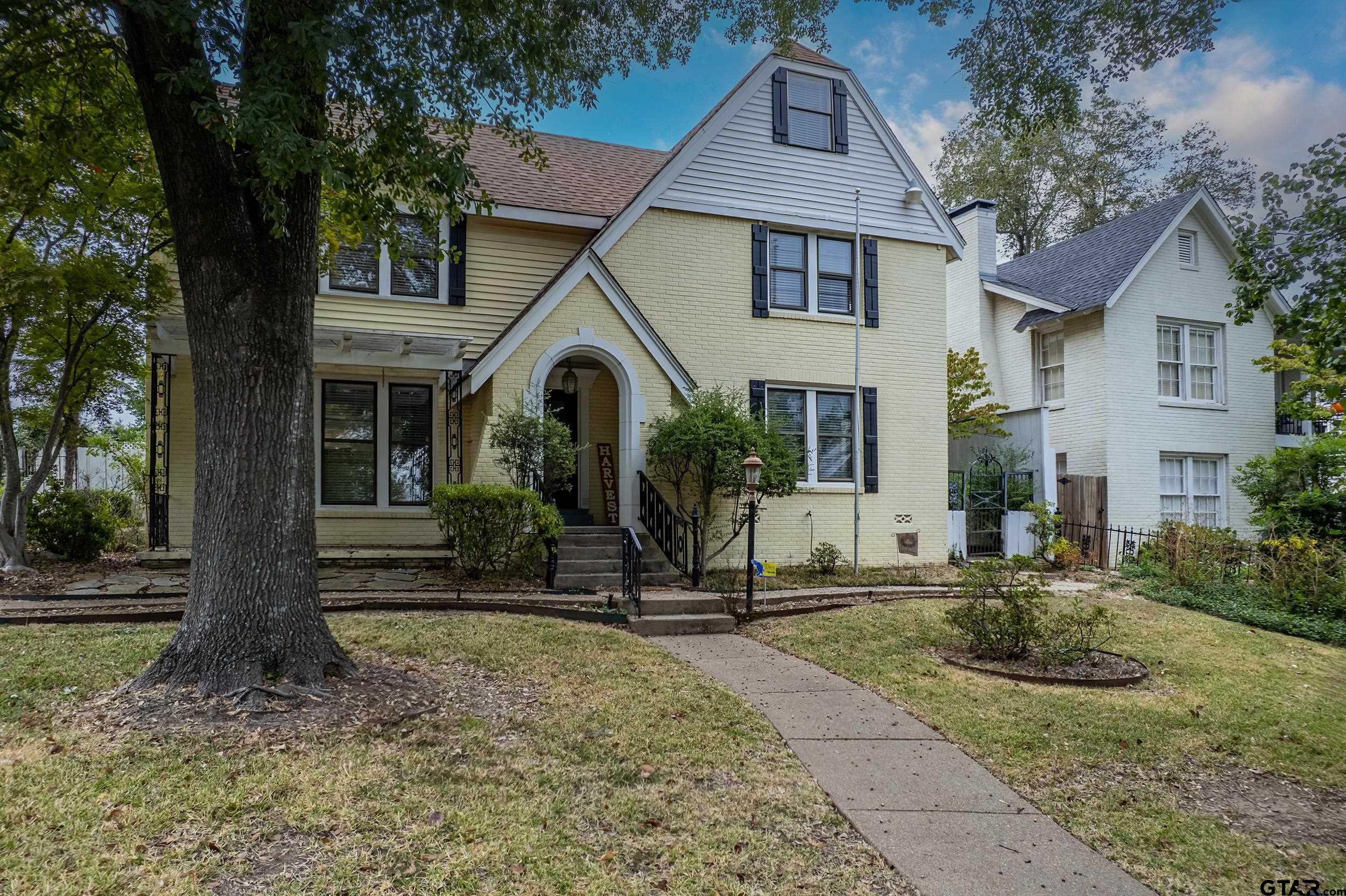 145 Rowland Place Tyler, TX 75701 - Photo 7 of 43 a front view of a house with garden