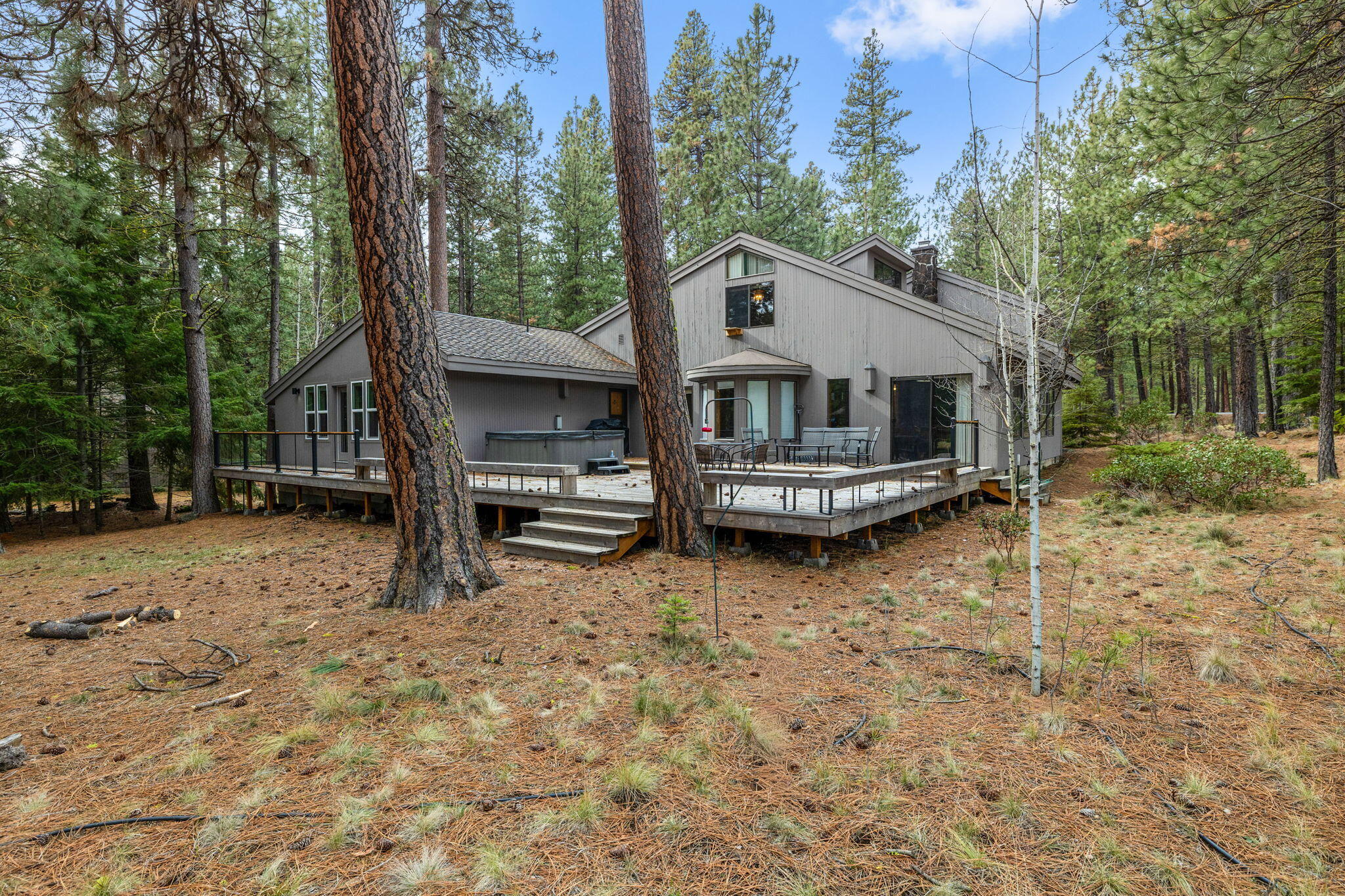 13168 Hawks Beard Black Butte Ranch, OR 97759 - Photo 38 of 47 a view of house with backyard and outdoor seating