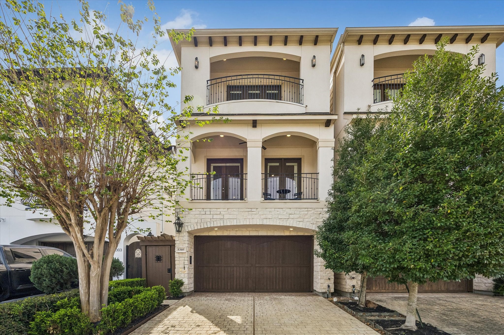 5305 Gibson Street Houston, TX 77007 - Photo 1 of 46 a front view of a building with a garden