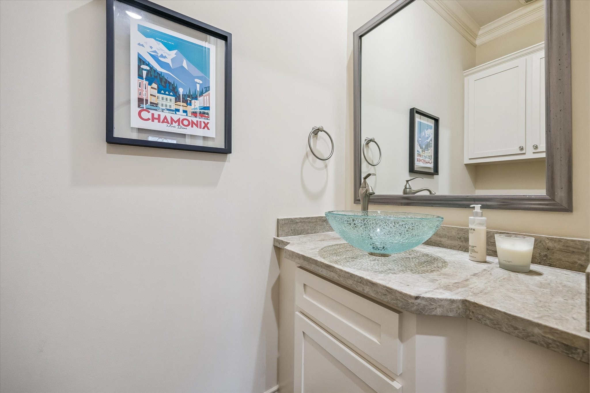 5305 Gibson Street Houston, TX 77007 - Photo 17 of 46 a bathroom with a granite countertop sink and a mirror
