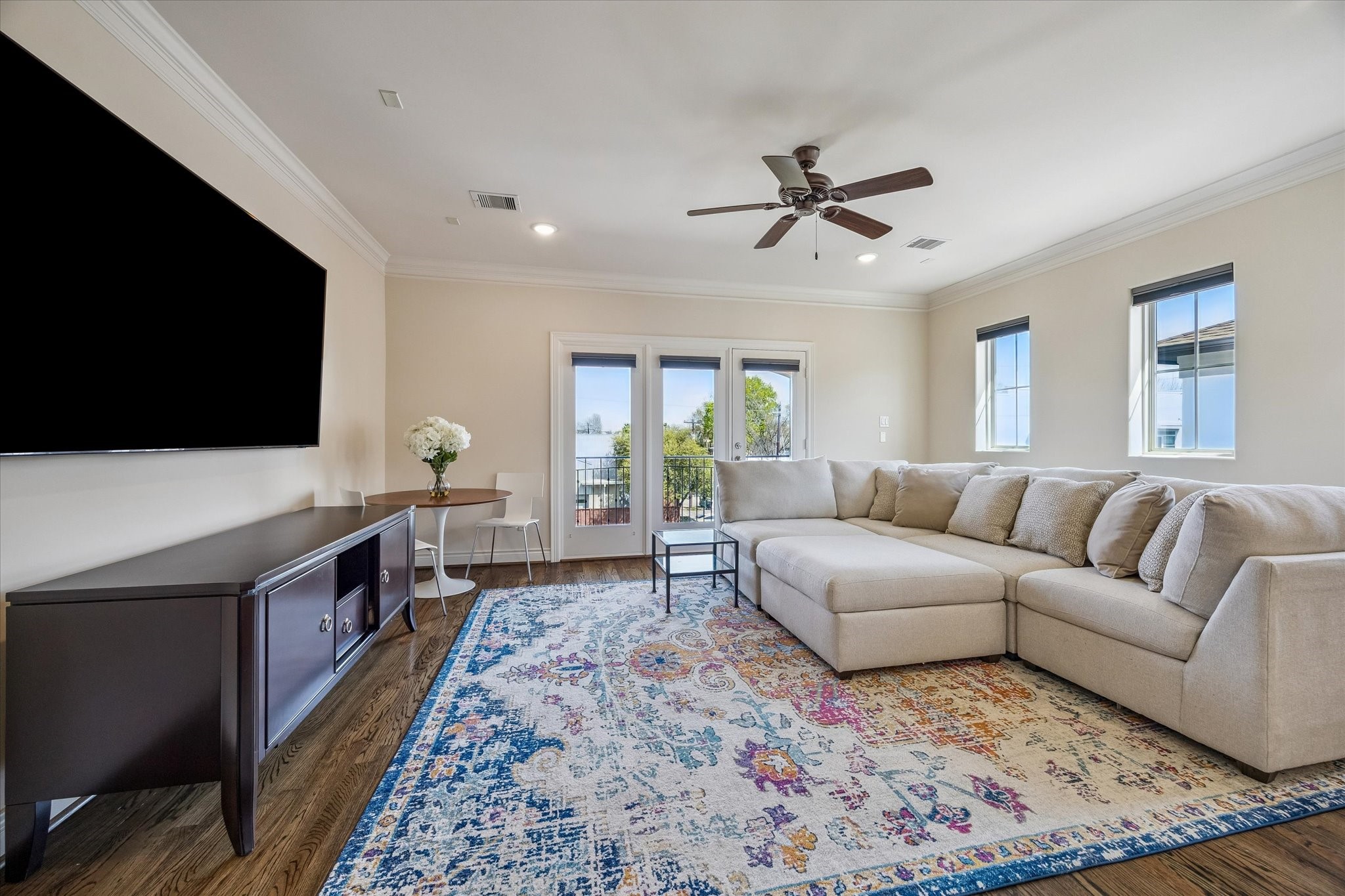 5305 Gibson Street Houston, TX 77007 - Photo 34 of 46 a living room with furniture and a flat screen tv