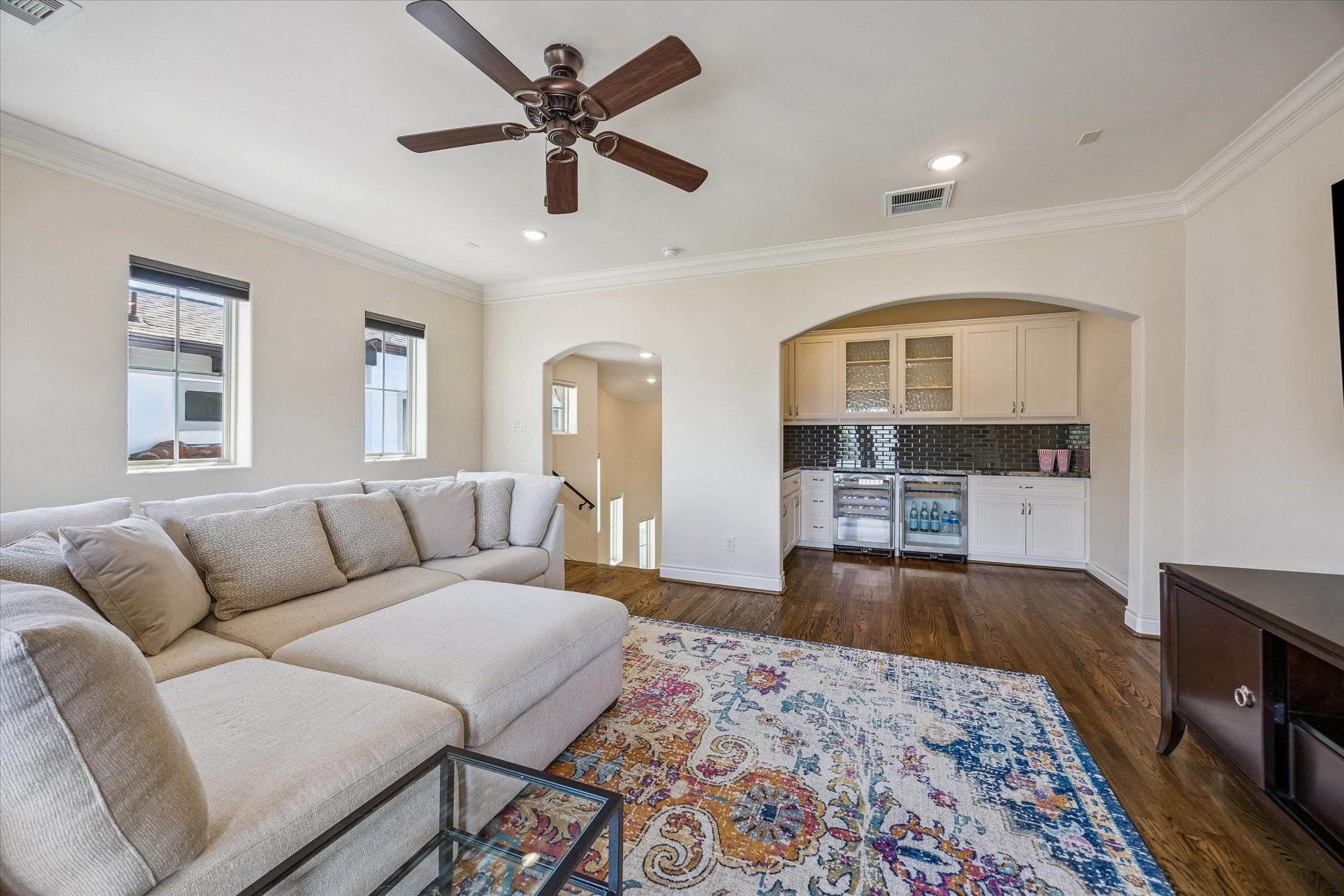 5305 Gibson Street Houston, TX 77007 - Photo 36 of 46 a living room with furniture and a rug