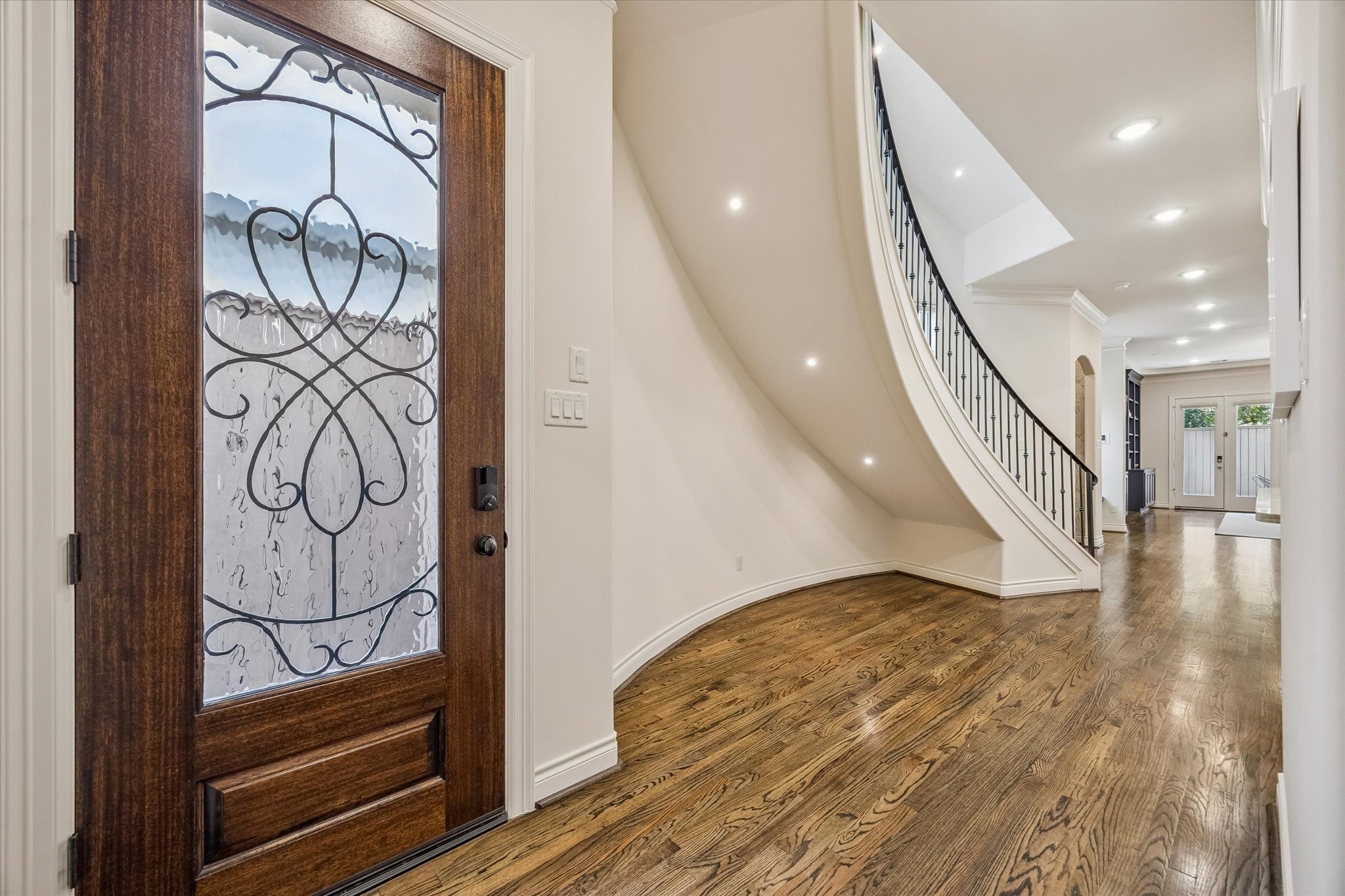 5305 Gibson Street Houston, TX 77007 - Photo 5 of 46 a view of entryway and hall with wooden floor