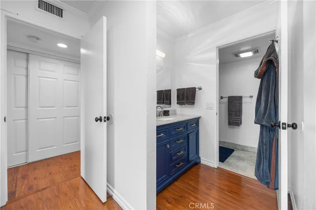 a spacious bathroom with a tub and a sink