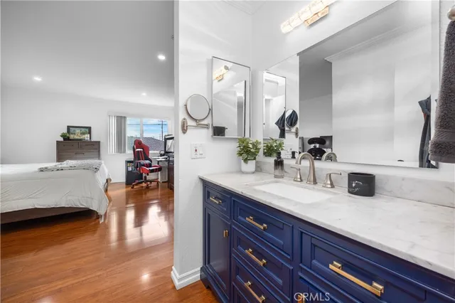 a kitchen with sink and cabinets