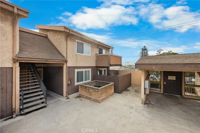 a view of a house with a yard and garage