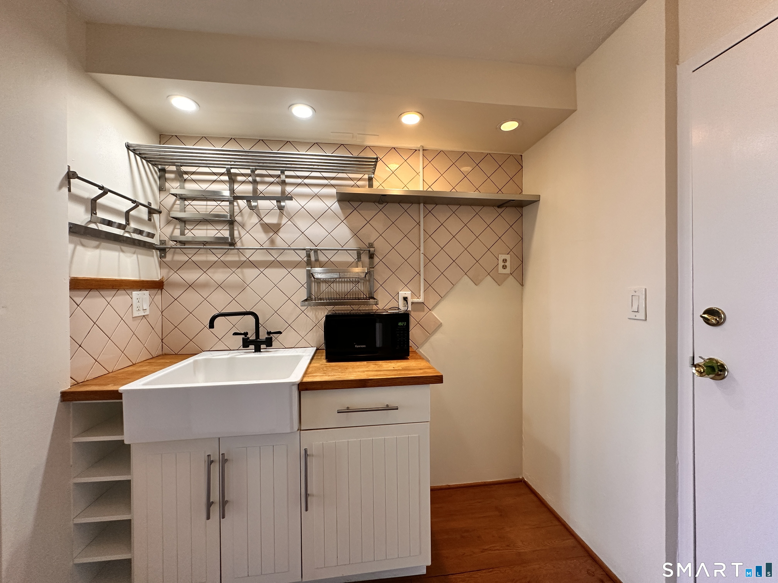 25 Ellsworth Street, Unit 17 Bridgeport, CT 06605 - Photo 25 of 30 a room with storage and utility